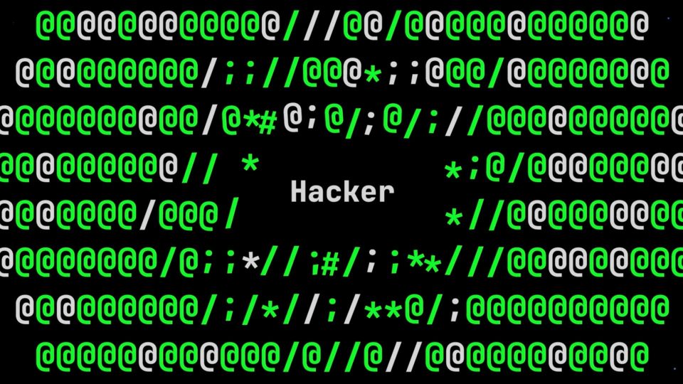 The word Hacker is in the center on a black background, surrounded by rows of green and white symbols (@, /, ;, :, *, #, and !), evoking digital code or hacking graphics—perfect for a RED Hackathon Summit or Flatwhite Motion event. Frame from Stash Magazine article.