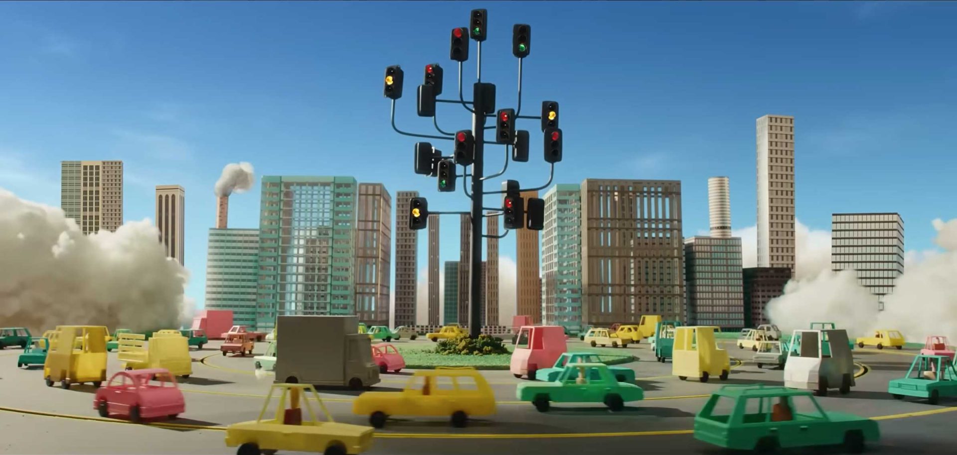 Colorful toy cars circle a roundabout with a tall, tree-like structure made of numerous traffic lights—a whimsical scene reminiscent of Joel Kefali’s playful style. Tall buildings and clouds of smoke are visible in the background under a clear blue sky, suggesting an urban landscape where AA Insurance might just keep the little drivers safe. Frame from Stash Magazine article.