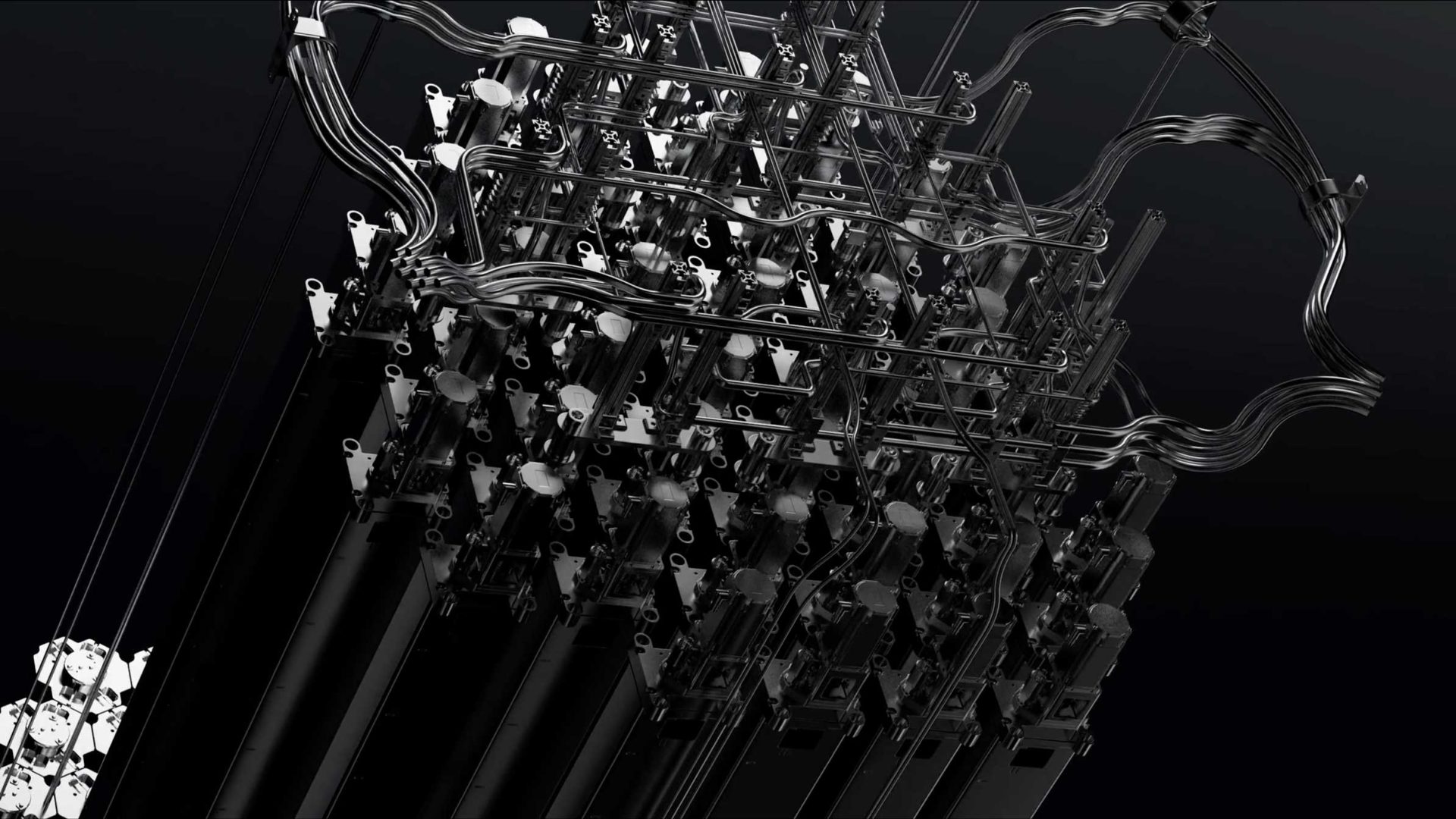 A close-up of a complex, metallic mechanical structure featuring interconnected rods, levers, and wires against a dark background, evoking the innovative spirit of the Aalo Atomic Energy Without Limits brand film by Stylo Creative. Frame from Stash Magazine article.