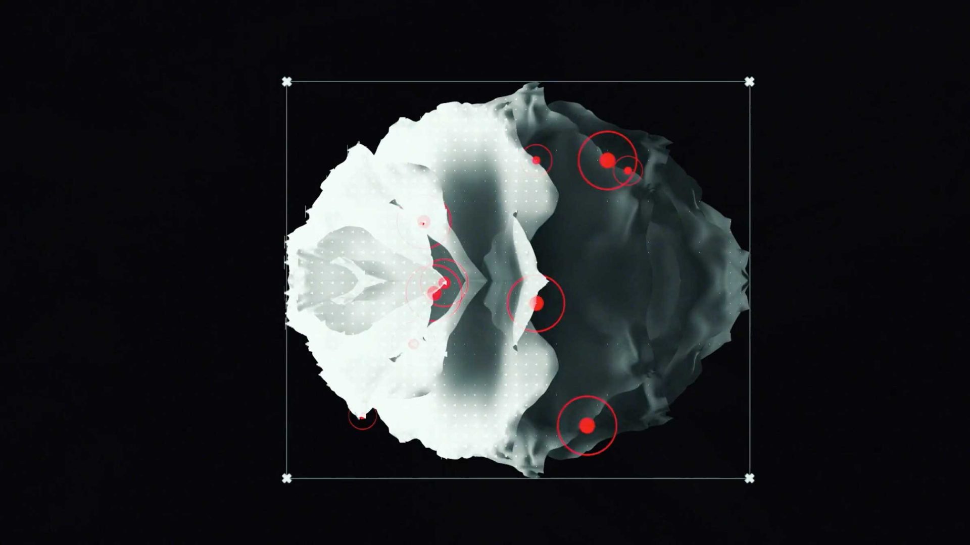 Abstract, symmetrical, white organic shape on a black background, overlaid with red circles and dots in a mirrored pattern—evoking a scientific or technological theme inspired by João Vaz Oliveira and Afonso Amaro at Atlas Festival. Frame from Stash Magazine article.