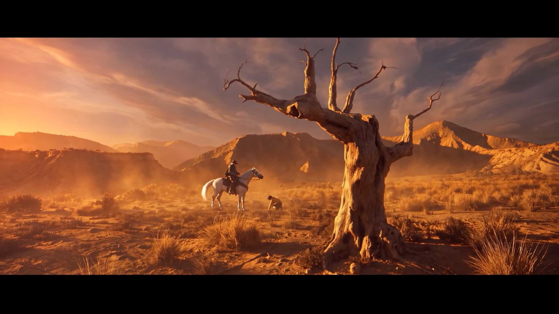 A person on a white horse stands near a kneeling figure in a desert landscape defined by Andalusian magic, with a large, leafless tree in the foreground. Frame from Stash Magazine article.