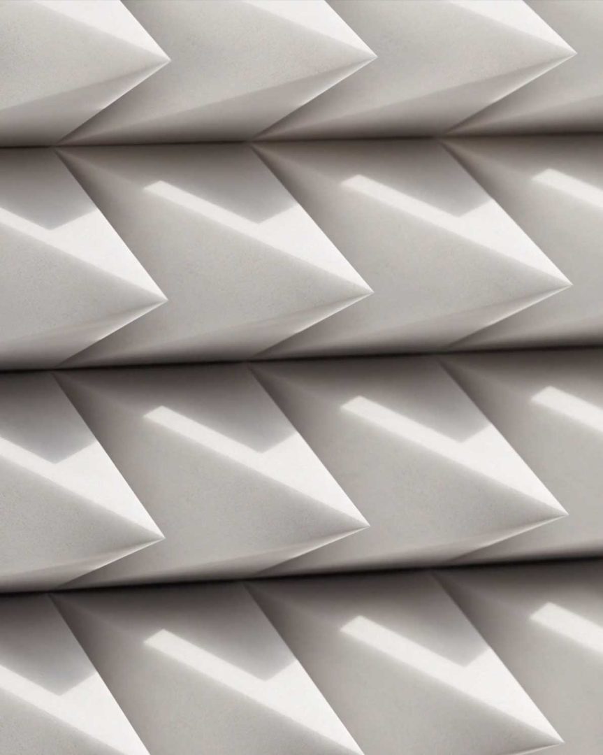Close-up of a geometric pattern featuring rows of three-dimensional, diamond-shaped forms casting angular shadows on a light gray surface—evoking the sleek, sculptural aesthetics found in Valen Supercar and Tomorrow Bureau’s design language. Frame from Stash Magazine article.