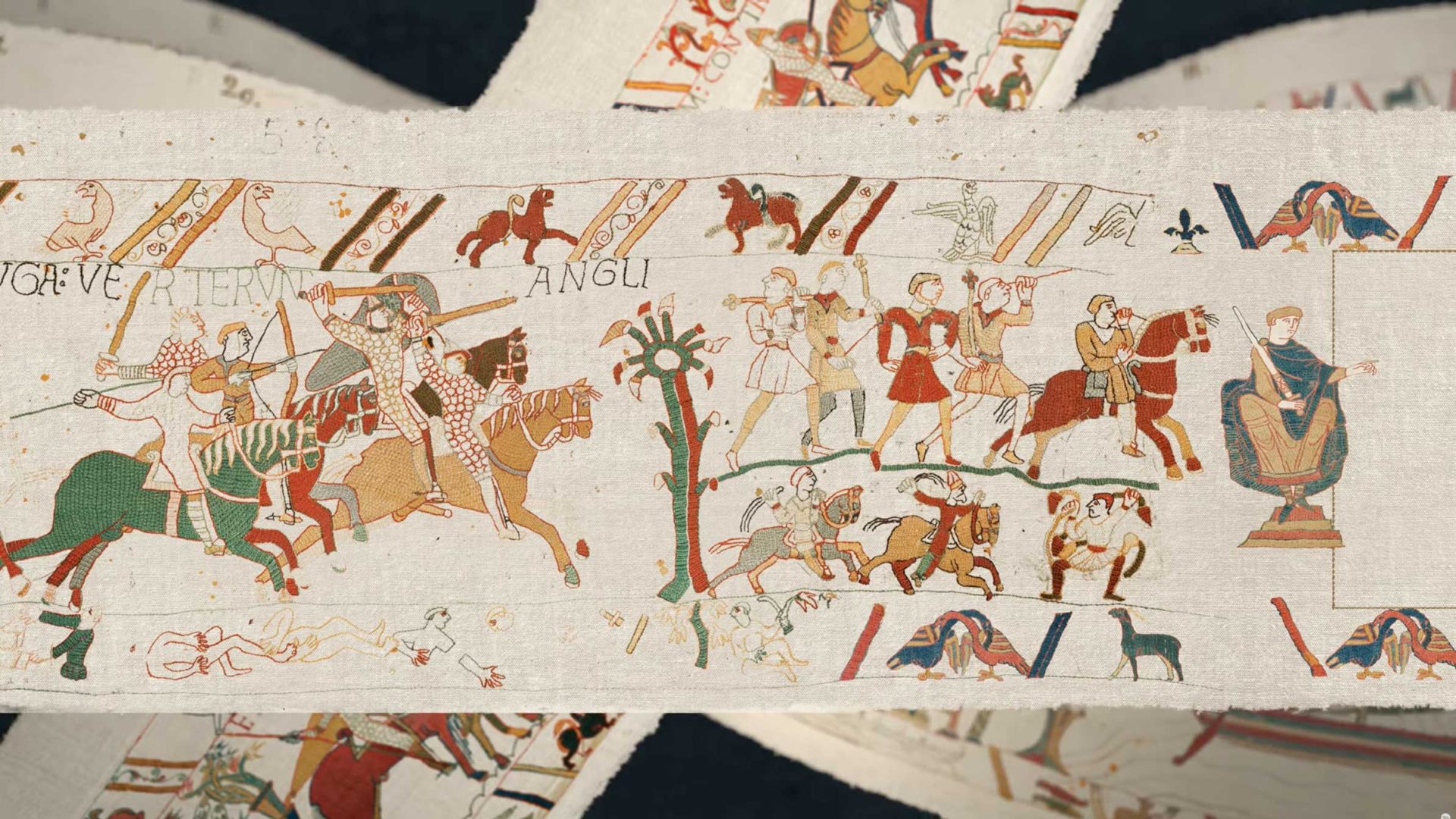 Section of the Bayeux Tapestry showing medieval figures in battle, knights on horseback, archers, animals, and a figure seated on a throne—all stitched in colored thread on fabric—capturing the drama and subtle magic of history in every detail. Frame from Stash Magazine article.