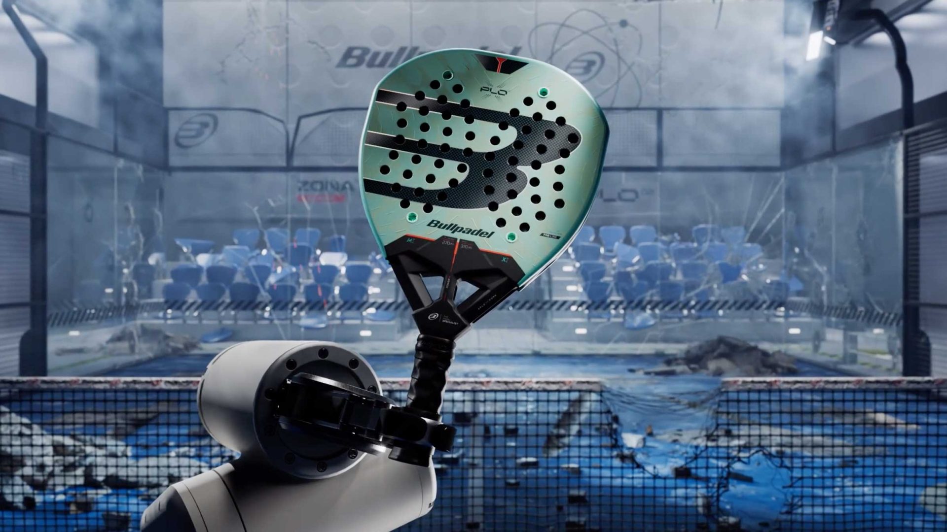A robotic arm holds a Bullpadel Xplo 02 padel racket in the center of a court. Frame from Stash Magazine article.