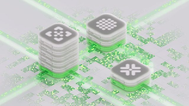 Three stacks of white, square microchips with glowing symbols sit on a circuit board with green lit pathways, representing digital connections and technology integration—a visual style reminiscent of the CuspAI Brand Film by Wes Cockx. Frame from Stash Magazine article.