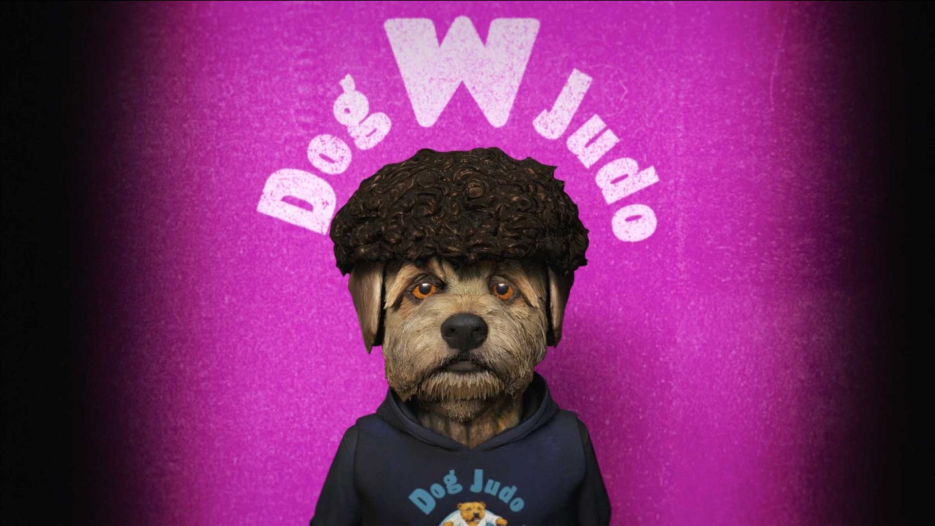 A dog with curly hair wearing a hoodie that says Dog Judo stands in front of a pink background with Dog Judo written above its head, ready to show off some Socials-worthy moves from the world of Dog & Rabbit. Frame from Stash Magazine article.