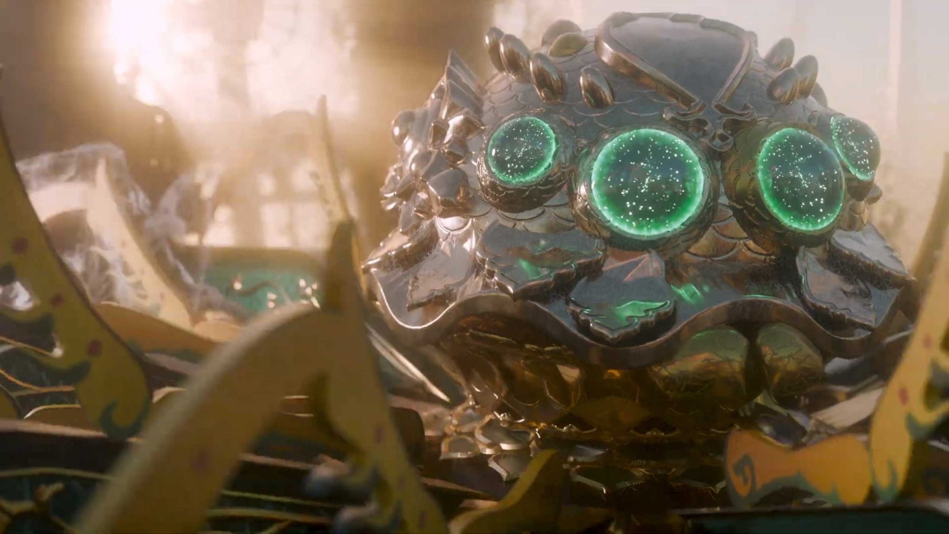 A large, ornate mechanical spider fantasy creature with multiple glowing green eyes and intricate golden details sits in a hazy, sunlit environment, as if ready to spin up in a filmic animation scene. Frame from Stash Magazine article.