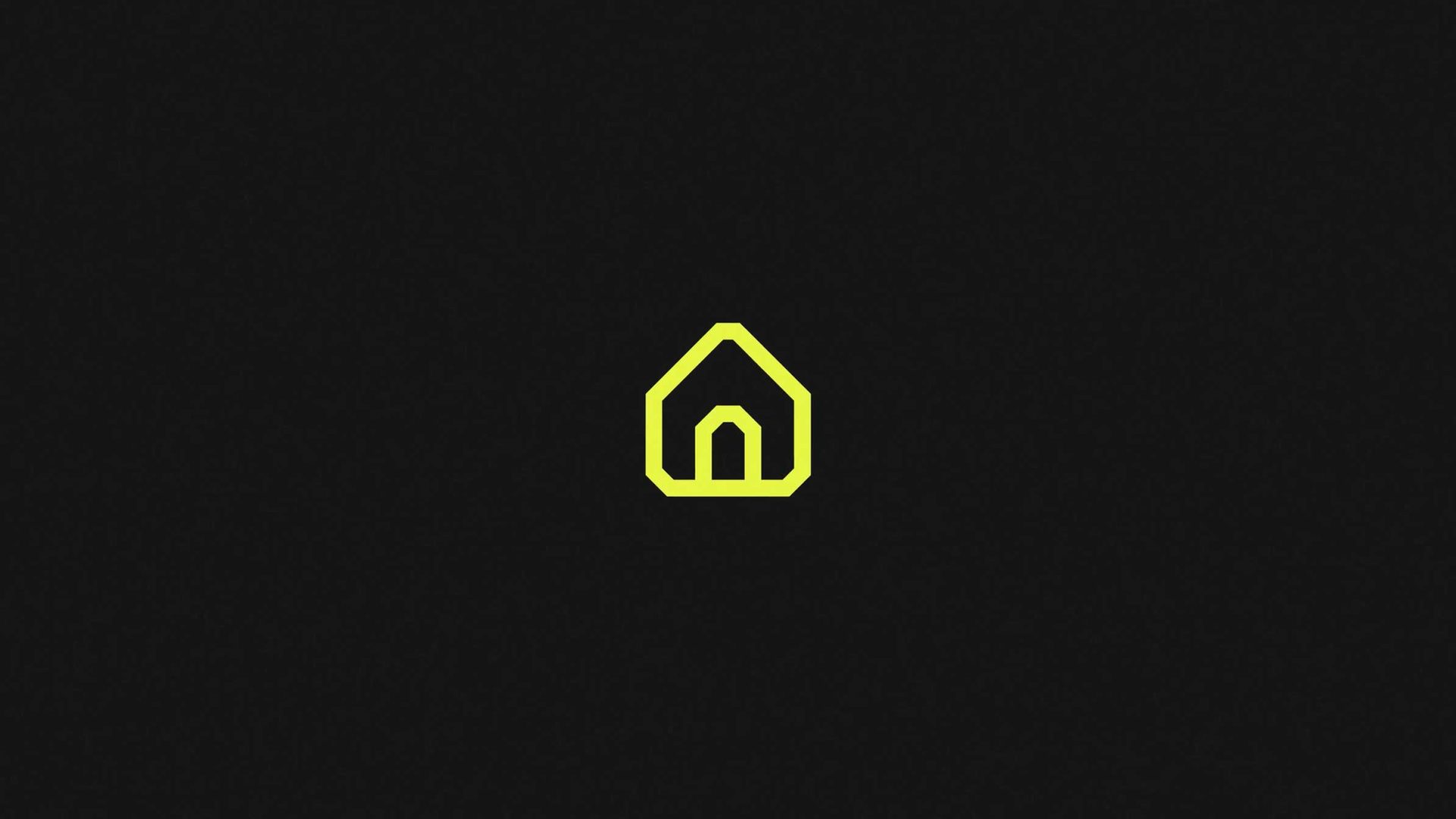 A minimalist yellow house icon on a dark, textured background, inspired by the clean design aesthetics of Manifesto Film. Frame from Stash Magazine article.