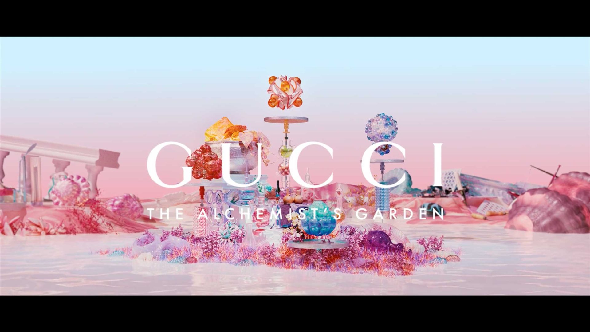 A surreal, pastel-colored landscape by Jieru Tang features fantastical, gem-like plants and objects. Large white text reads GUCCI THE ALCHEMIST’S GARDEN across the center of the image. Frame from Stash Magazine article.
