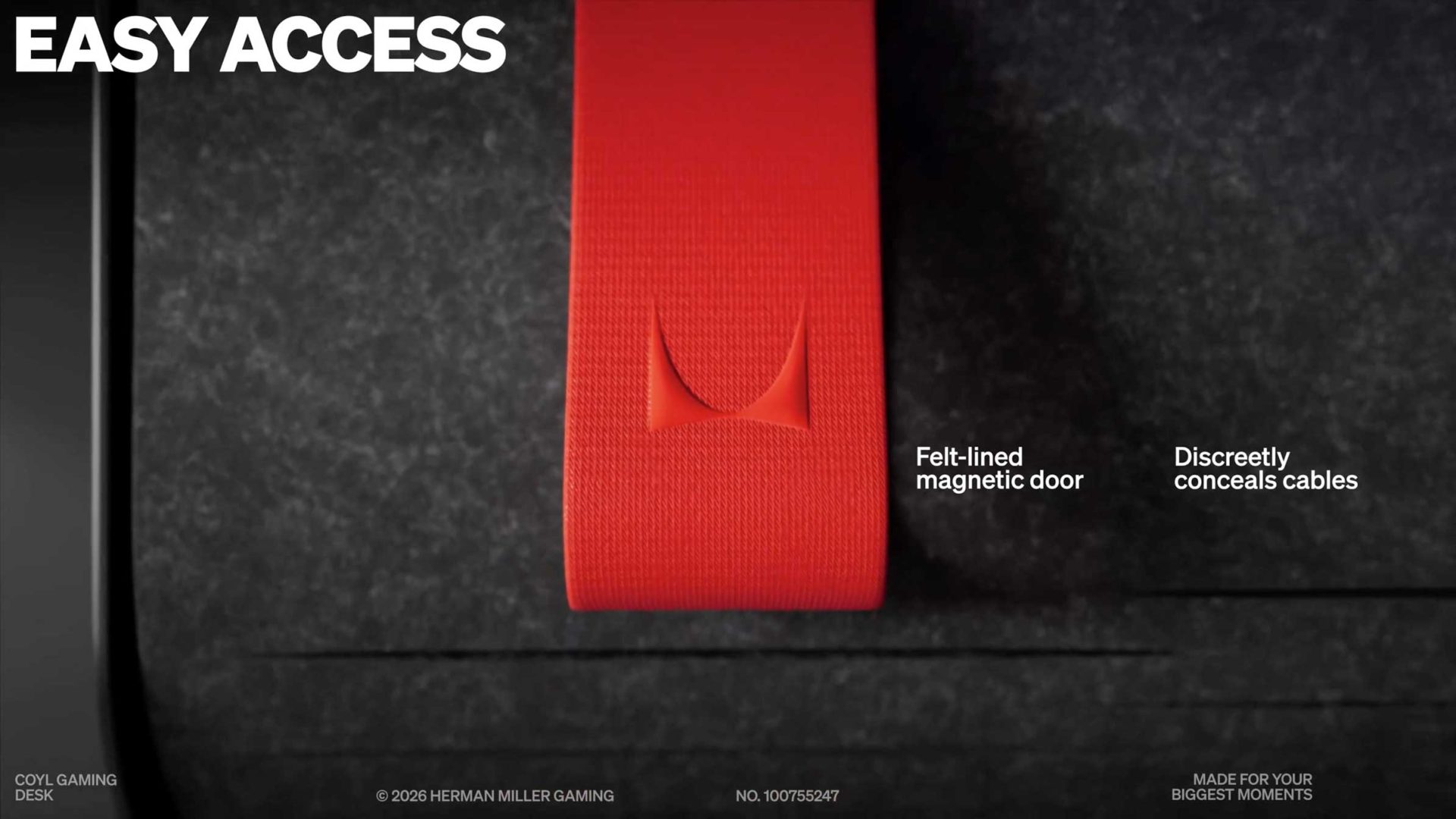 A close-up of a red, felt-lined magnetic door on a dark surface, from the Herman Miller Gaming COYL Brand Film by Paper Crowns. Discreetly conceals cables with the words EASY ACCESS in bold at the top left. Frame from Stash Magazine article.