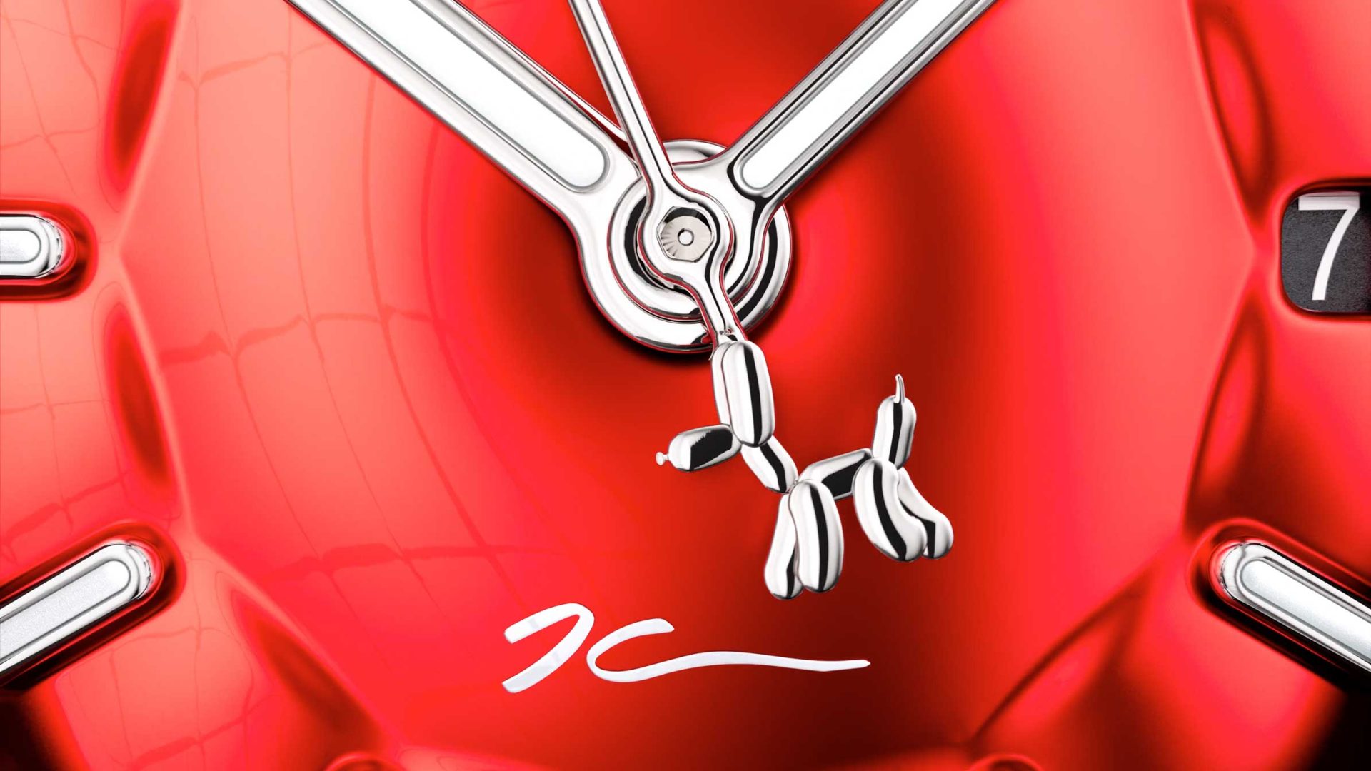 Close-up of a red watch face with silver hands and a tiny silver balloon dog as the second hand, paying homage to Jeff Koons’ iconic art. The background reflects light, and there’s a white signature near the center—hallmarks of the Classic Fusion Balloon Dog by Hublot. A partial date window shows the number 7. Frame from Stash Magazine article.