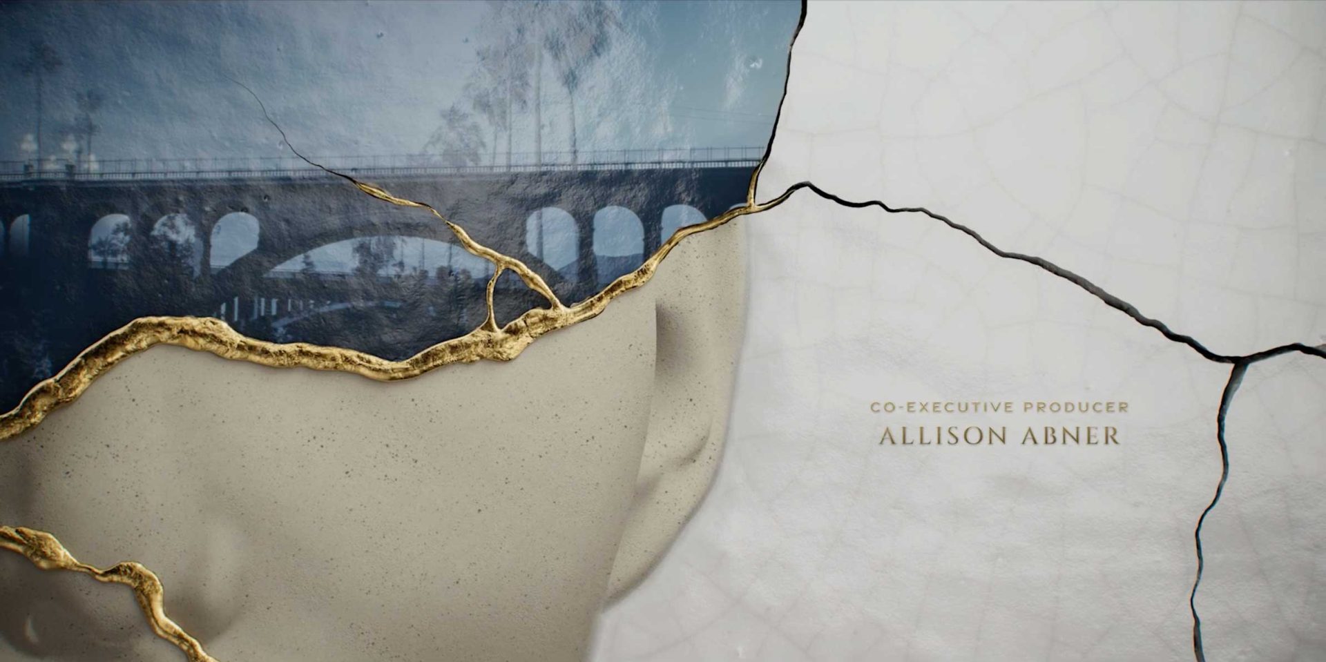 A cracked surface with gold repairs overlays a sepia-toned image of a bridge. The text “Co-Executive Producer Allison Abner” appears on a light textured area beside the cracks, evoking the signature style of Imaginary Forces for Apple TV+. Frame from Stash Magazine article.