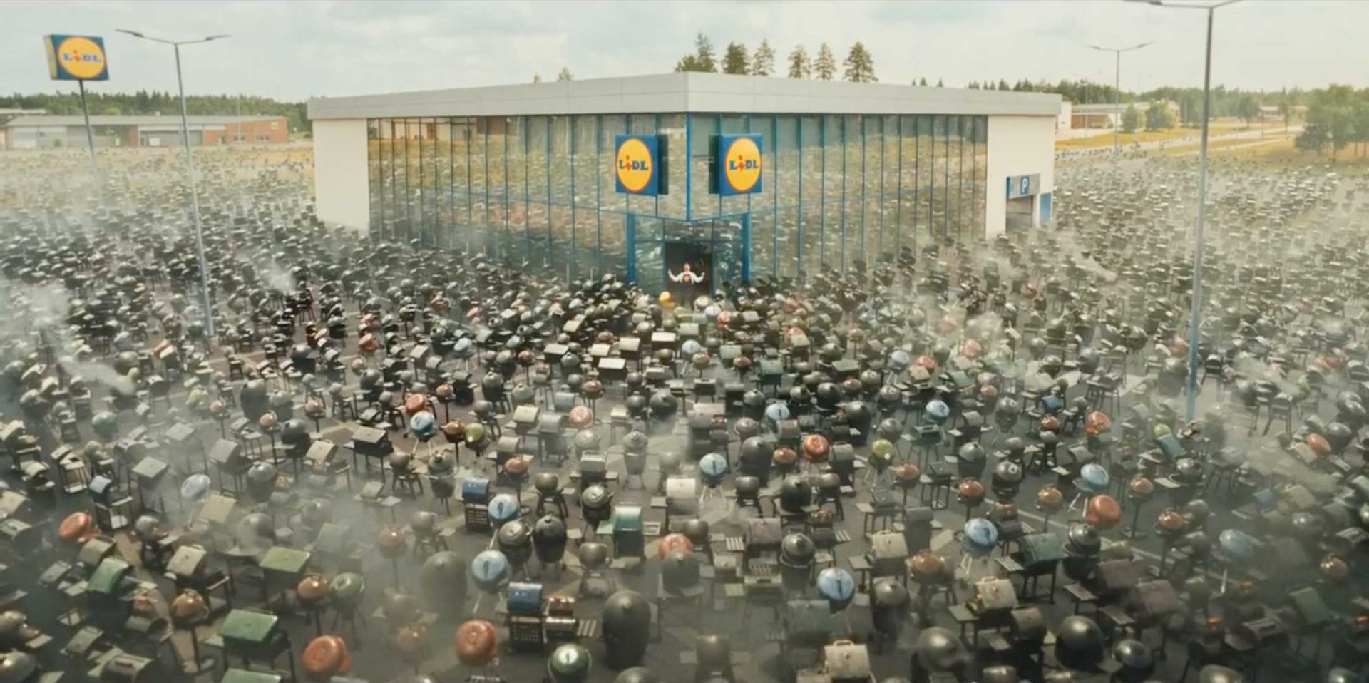 Crowd in helmets rush toward the entrance of a large Lidl Finland supermarket, pushing carts as smoke rises, evoking a scene from Pete Riski’s Barbecue Piper. Large glass windows and the iconic Lidl logo loom above the doors. Frame from Stash Magazine article.