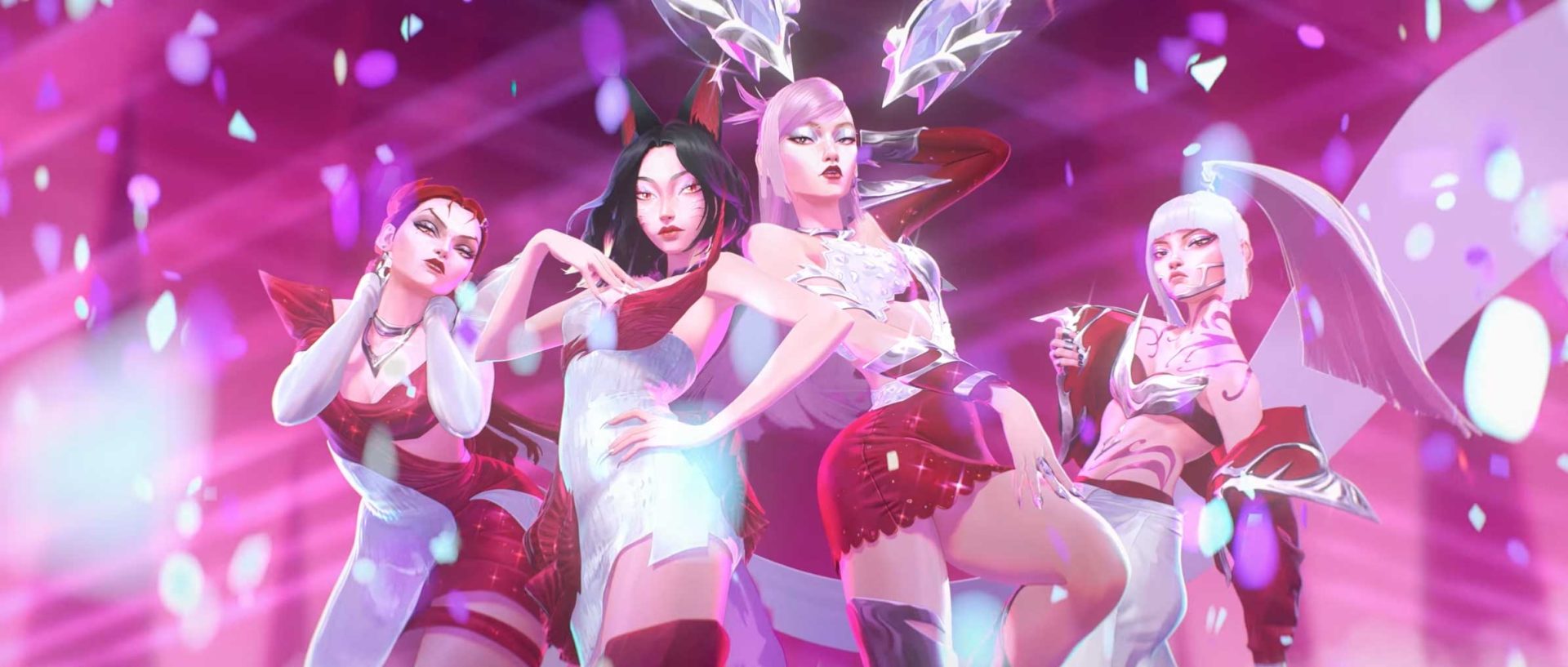 Four stylized K/DA female characters in coordinated red and white Firestarter outfits posing together against a bright pink background with falling petals. Frame from Stash Magazine article.