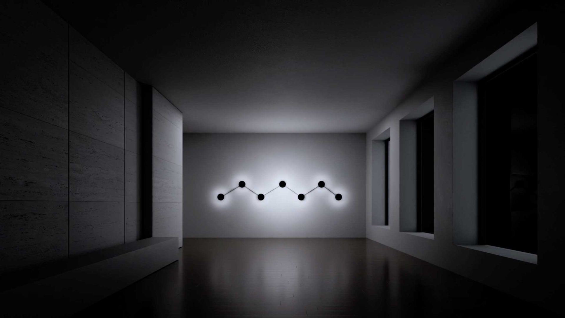 A minimal, modern room with dark floors and large windows features the Lodes MAP lighting product by jformento: five circular lights connected in a zigzag, geometric pattern on the far wall. The space is empty and dimly lit. Frame from Stash Magazine article.
