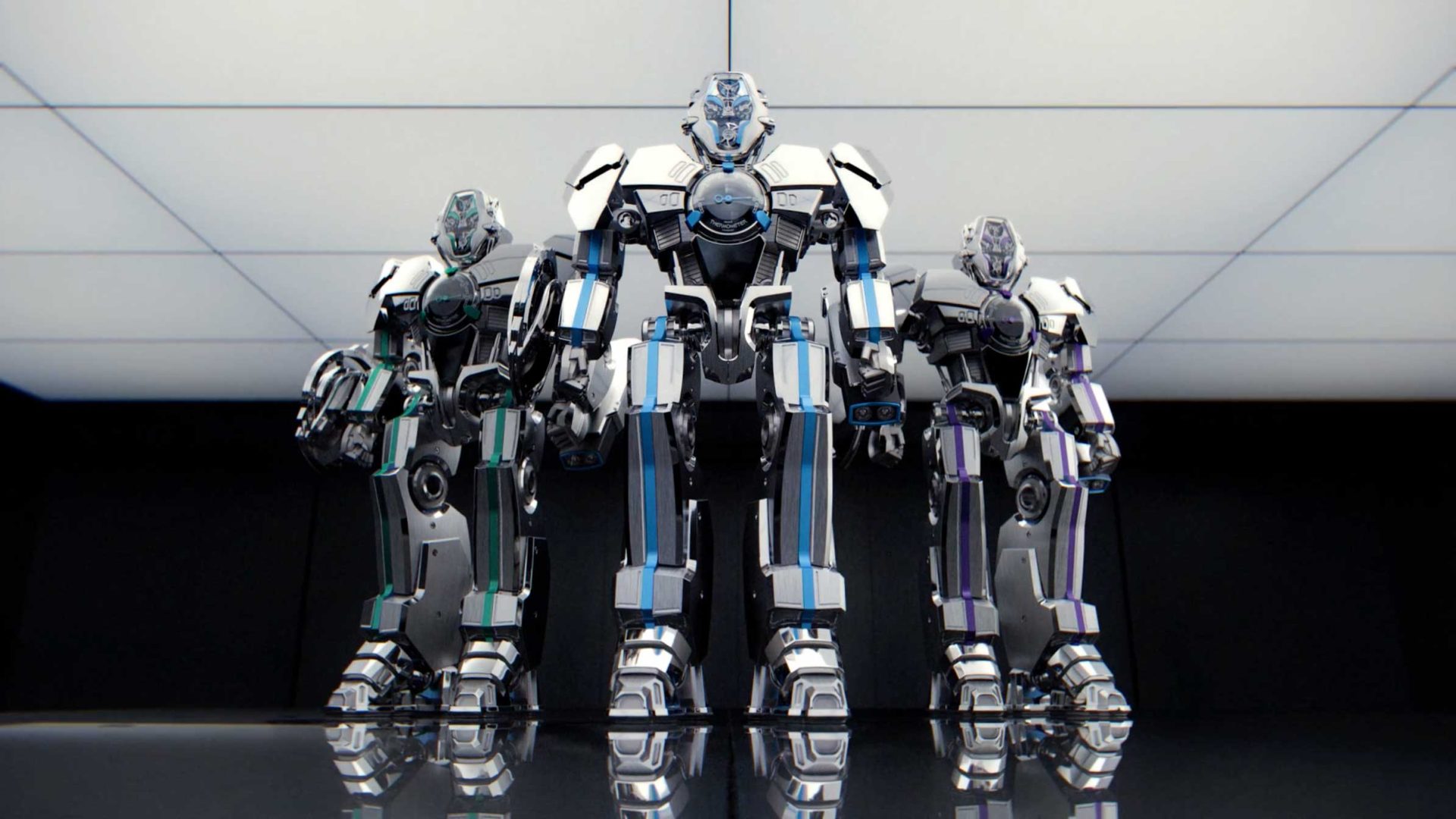 Three futuristic humanoid robots stand side by side in a brightly lit, modern room with a reflective floor. Channeling the advanced style of I Robot, their metallic bodies and glowing blue accents make them appear powerful and cutting-edge. Frame from Stash Magazine article.