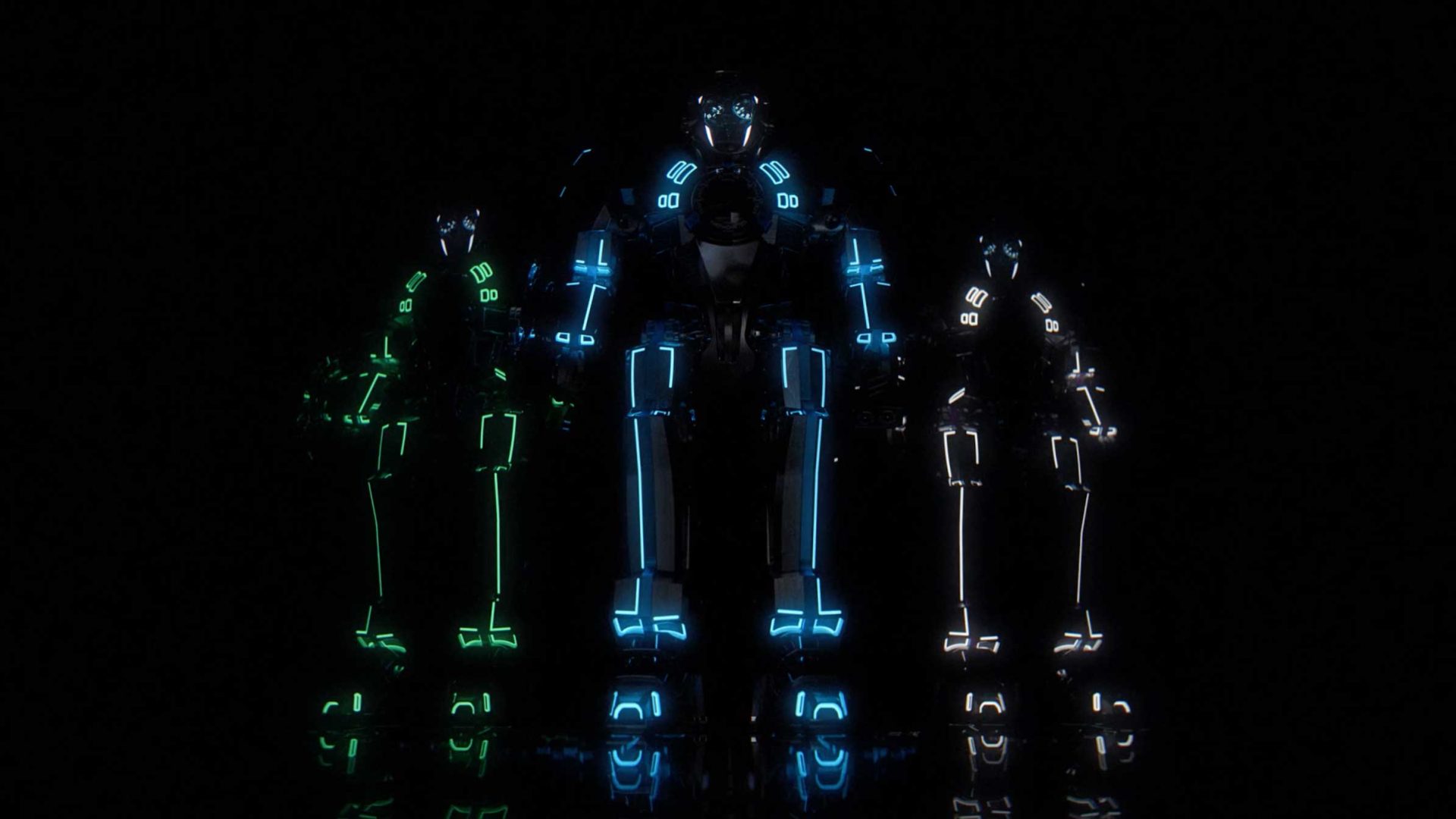 Three humanoid robots with glowing neon outlines in green and blue evoke an I Robot vibe as they stand against a dark background, their illuminated features and reflections channeling MB&F’s futuristic, high-tech aesthetic. Frame from Stash Magazine article.