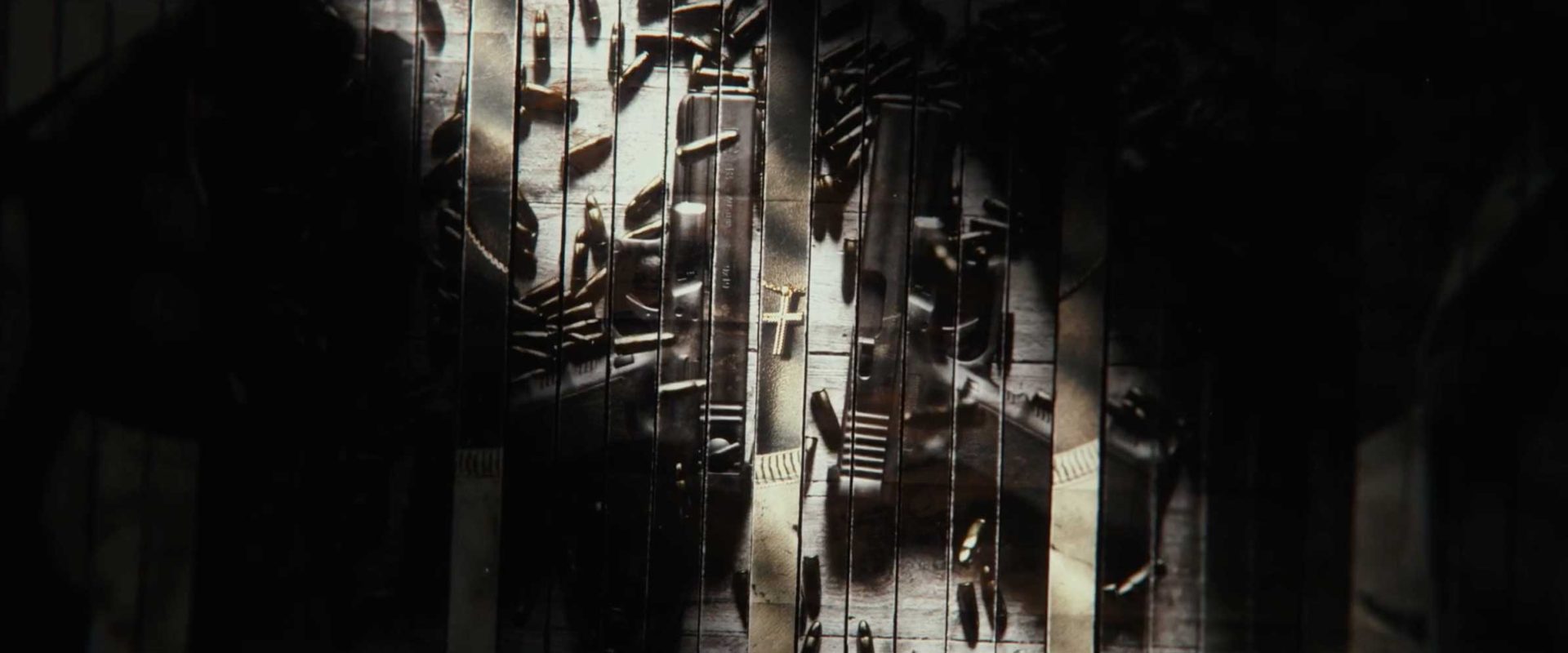 Abstract, high-contrast image of black and white piano keys, with dramatic lighting casting shadows that create a fragmented, almost chaotic appearance across the keys—evoking the suspenseful mood of main titles in a Netflix series like Man on Fire. Frame from Stash Magazine article.