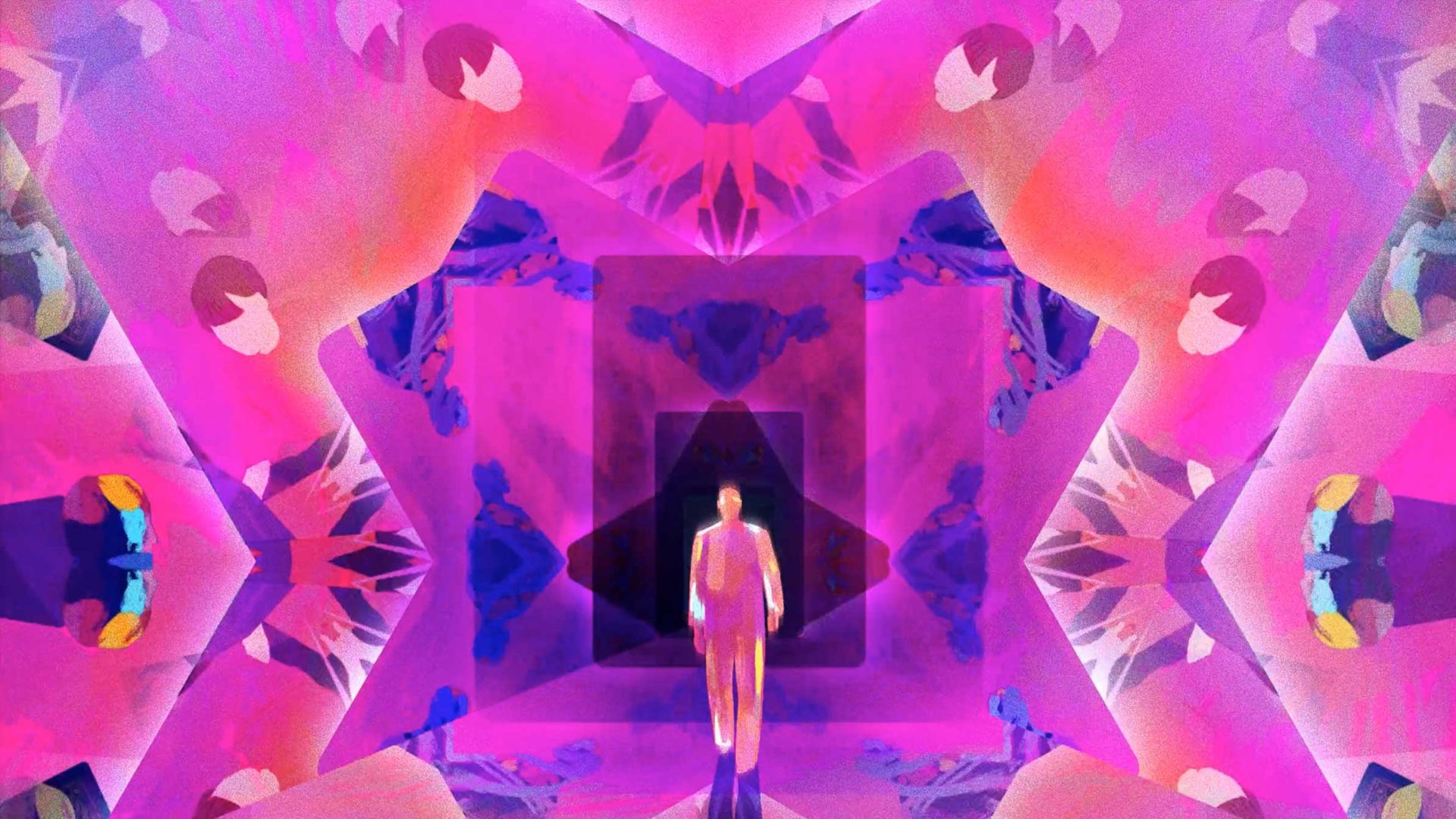 A person stands at the center of a vibrant, symmetrical scene inspired by Mixcode, with geometric shapes and mirrored patterns in pink, purple, and blue tones, surrounded by abstract human faces and figures—like a scene from a visual TV series. Frame from Stash Magazine article.