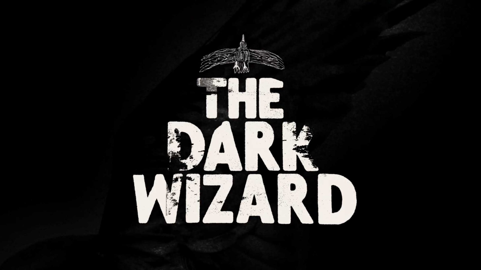 Bold white text reads THE DARK WIZARD on a dark background, with a sketch of a bird or creature with outstretched wings above the text, evoking the mysterious, dramatic tone of HBO’s Opening Titles for The Dark Wizard Doc. Frame from Stash Magazine article.