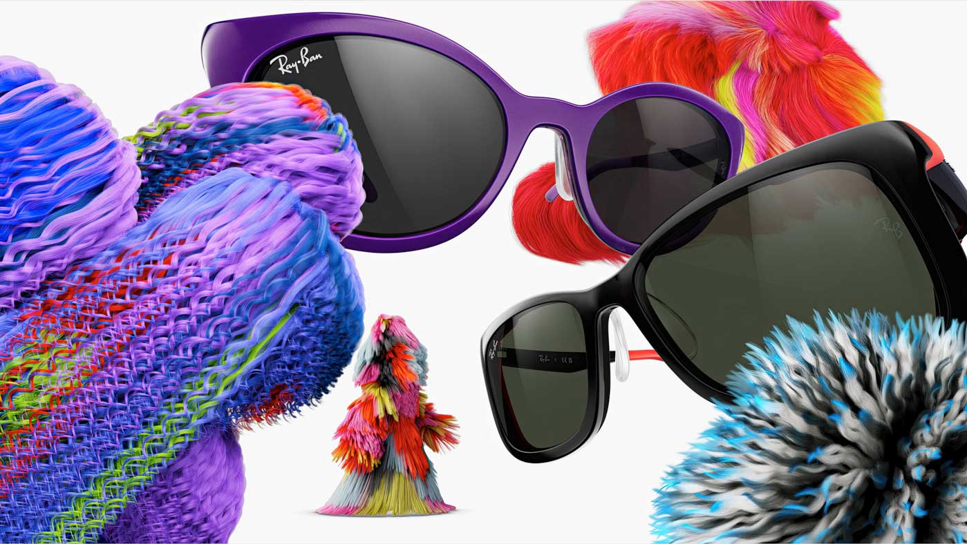 Colorful, textured, furry objects surround three pairs of stylish sunglasses—one purple, one black, and one black with red details—against a white background in this playful Ray-Ban Kids Campaign by Ditroit and C41. Frame from Stash Magazine article.