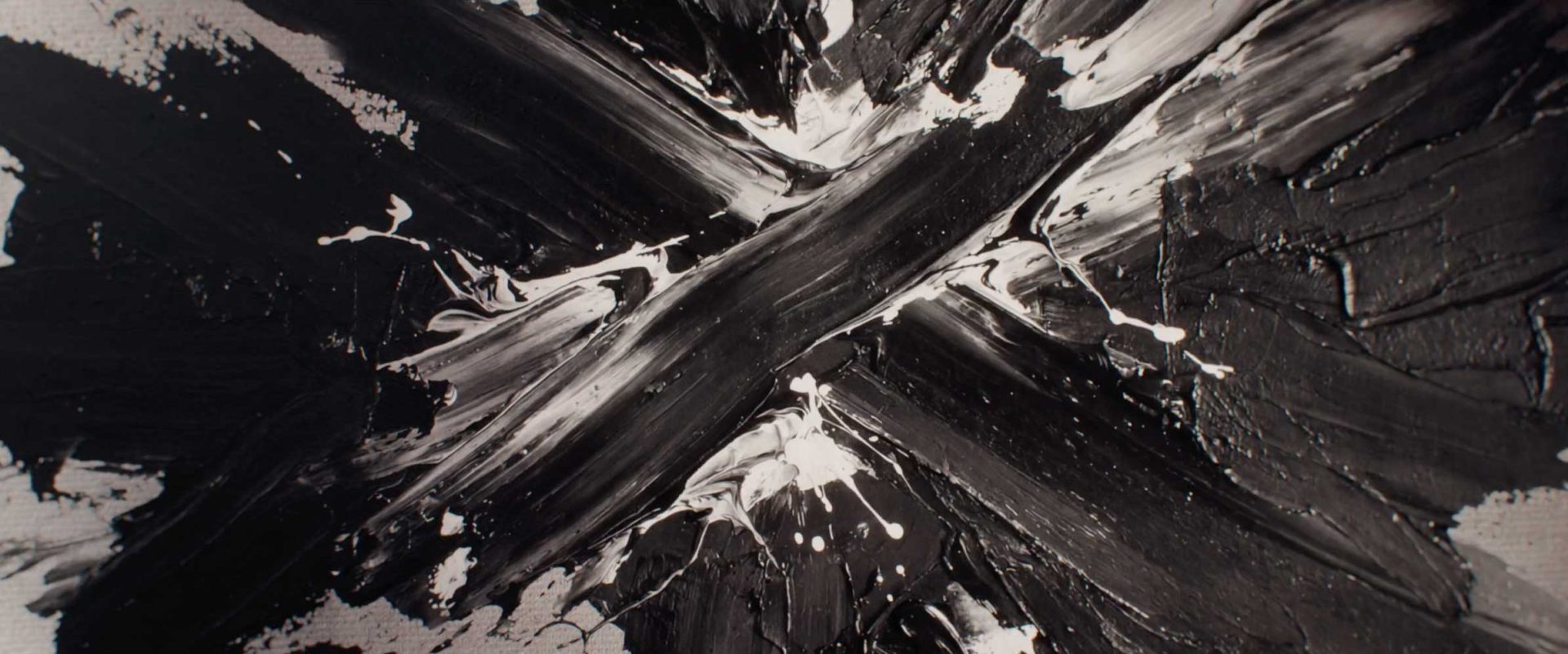 Abstract painting with thick, textured black and white brushstrokes forming a large X shape in the style of Ronnie Koff for Imaginary Forces. Frame from Stash Magazine article.