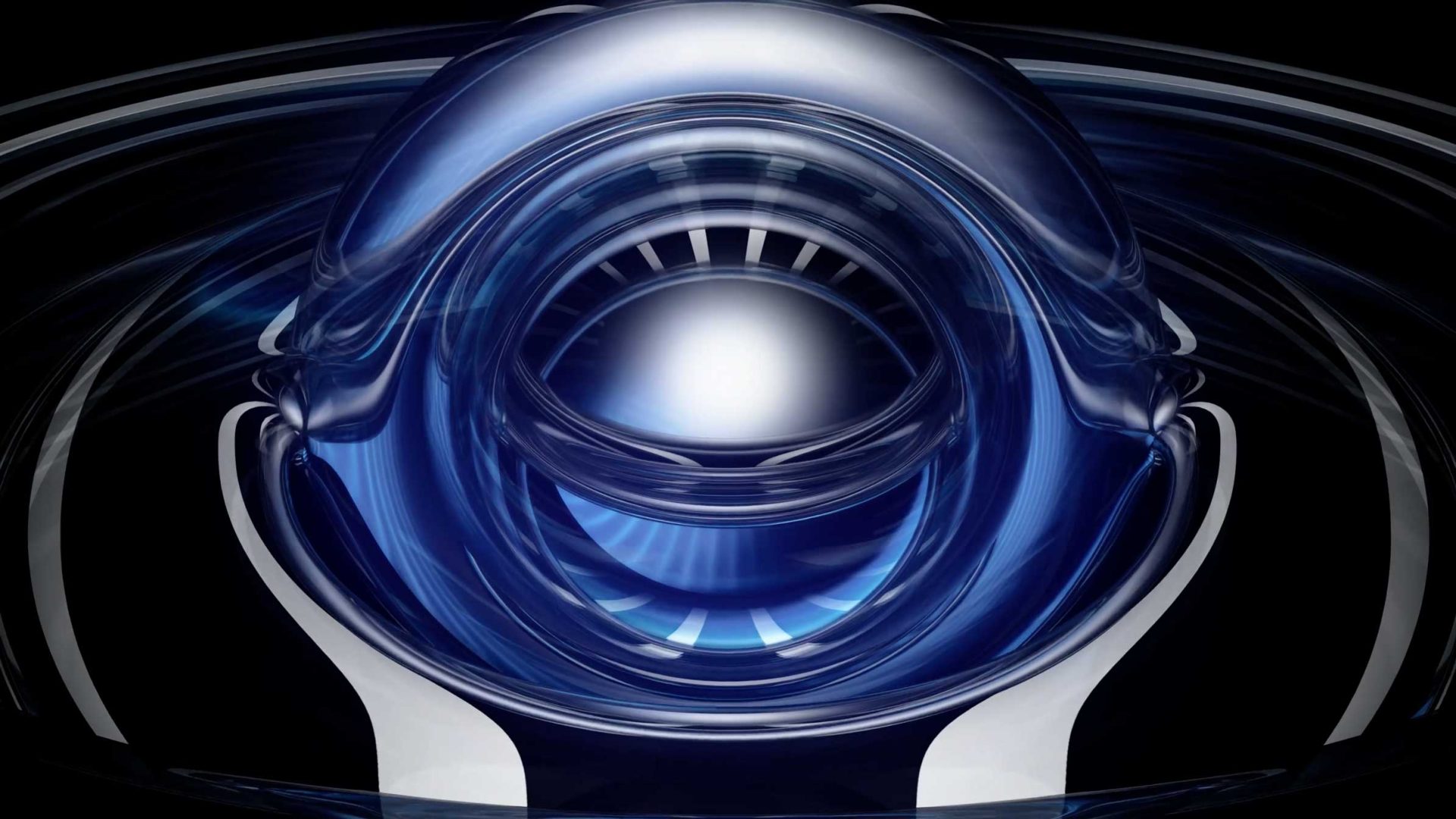A shiny, metallic blue and silver abstract shape resembling an eye with layered, reflective surfaces and a glowing central sphere takes center stage against a dark background, evoking the striking visual style of the Spheres demo reel by Vladislav Solovjov. Frame from Stash Magazine article.