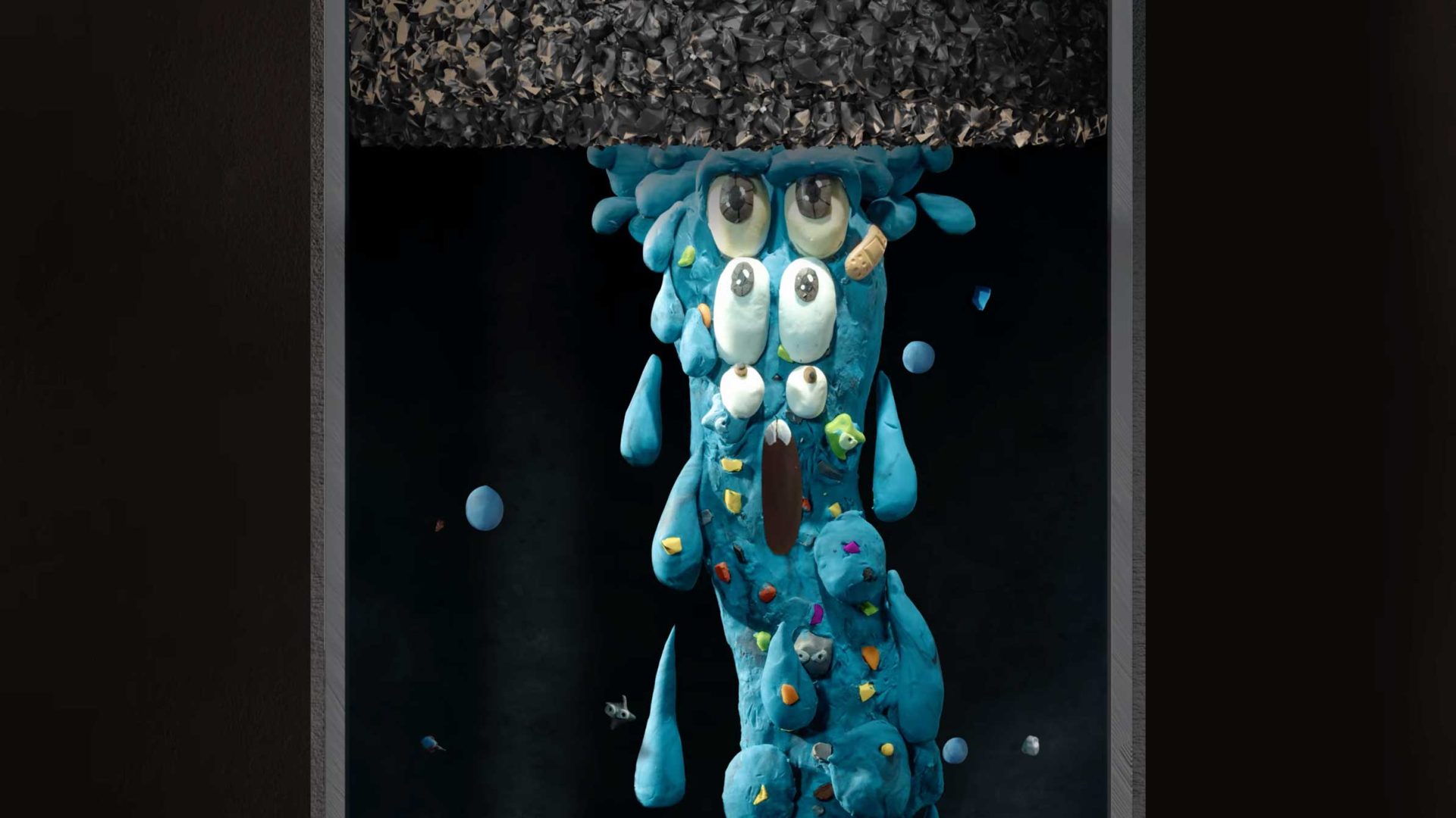 A tall, abstract blue creature made of clay with multiple eyes and teardrops stands beneath a dark, textured layer, as if it has emerged from the imaginative world of Planet Super. Small colorful objects are embedded in its body, and floating drops swirl around it in a scene reminiscent of Walter’s Water Song. Frame from Stash Magazine article.