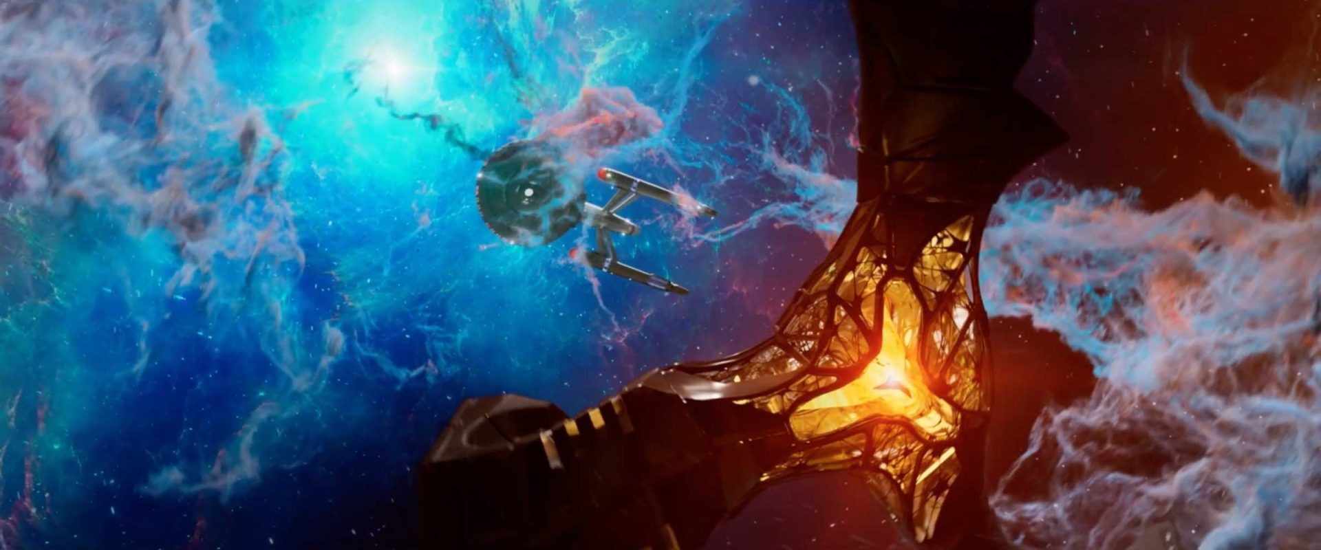 A starship flies through a colorful nebula in space, approaching a large glowing, mechanical structure with a fiery center—a new adventure unfolds in Star Trek: Strange New Worlds, setting the stage for an electrifying Season 4. Frame from Stash Magazine article.