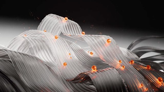Curved, metallic silver ribbons flow across the image with glowing orange spheres scattered throughout, creating a dynamic, futuristic look on a gradient gray background that evokes the innovative spirit of Reframe Studio and the lasting impression of memory. Frame from Stash Magazine article.