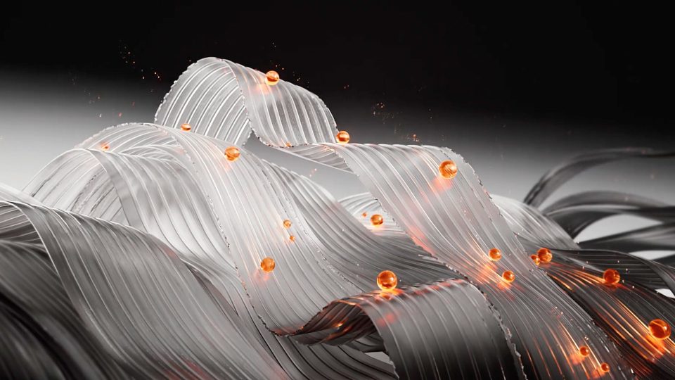 Curved, metallic silver ribbons flow across the image with glowing orange spheres scattered throughout, creating a dynamic, futuristic look on a gradient gray background that evokes the innovative spirit of Reframe Studio and the lasting impression of memory. Frame from Stash Magazine article.
