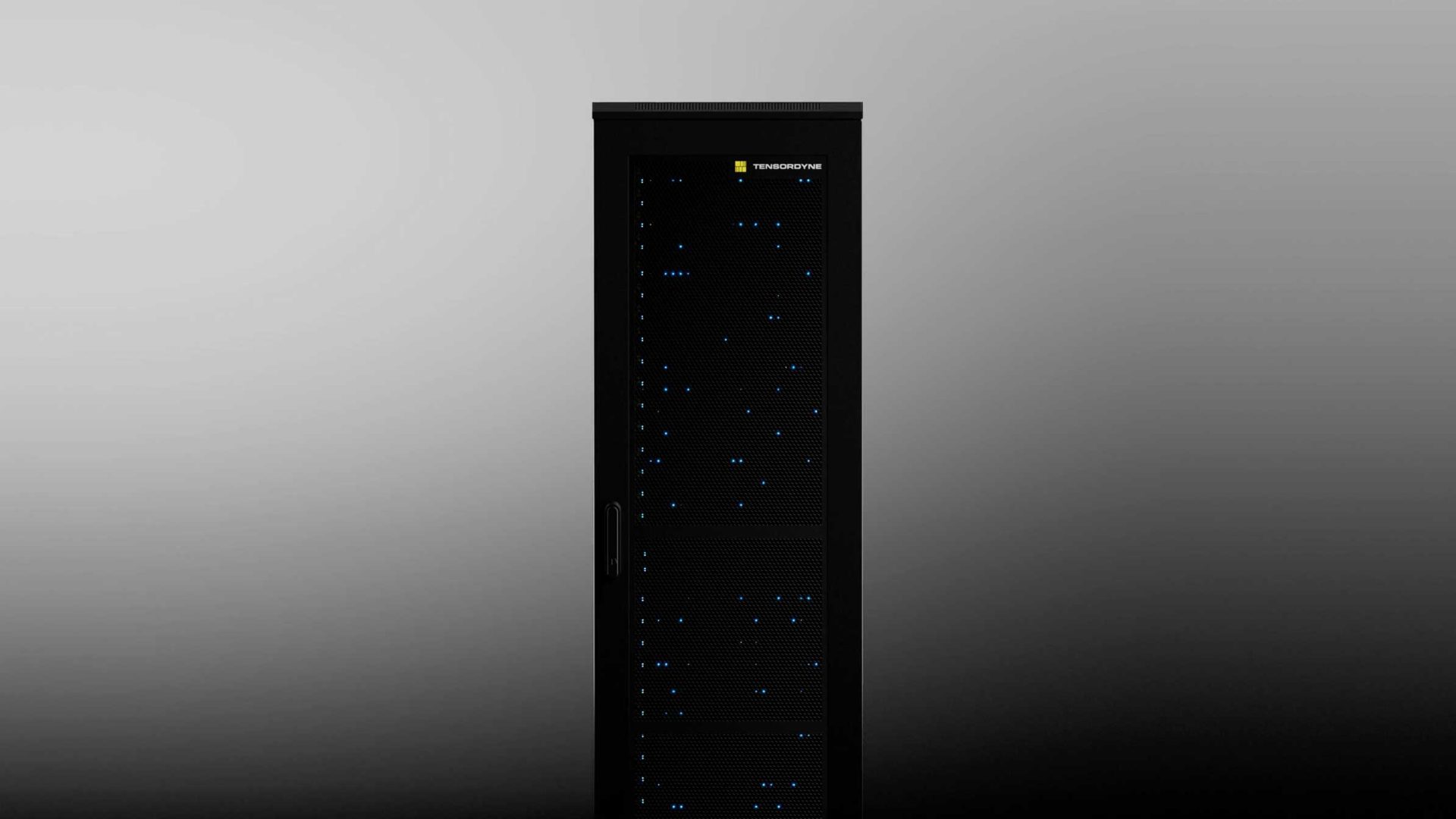 A black server rack with a mesh front door, small blue indicator lights, and a Transcendence logo at the top stands against a gradient gray background—designed in collaboration with Found Studio. Frame from Stash Magazine article.