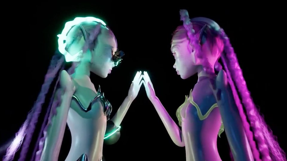 Two futuristic, glowing female figures with braided hair stand face to face, pressing their hands together. One is illuminated in green hues and the other in pink, both set against a dark background—a striking scene that embodies the spirit of "Make a Life Not Just a Living," reflecting the creative ethos of University of the Arts London. Frame from Stash Magazine article.