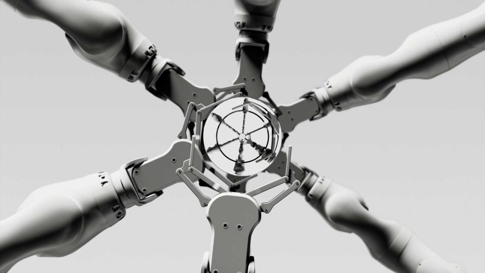 Six robotic arms with metal grippers are positioned in a circular formation, converging towards a central mechanism—reminiscent of the Vaonis Hyperia Telescope Launch Film—viewed from below against a plain gray background. Frame from Stash Magazine article.
