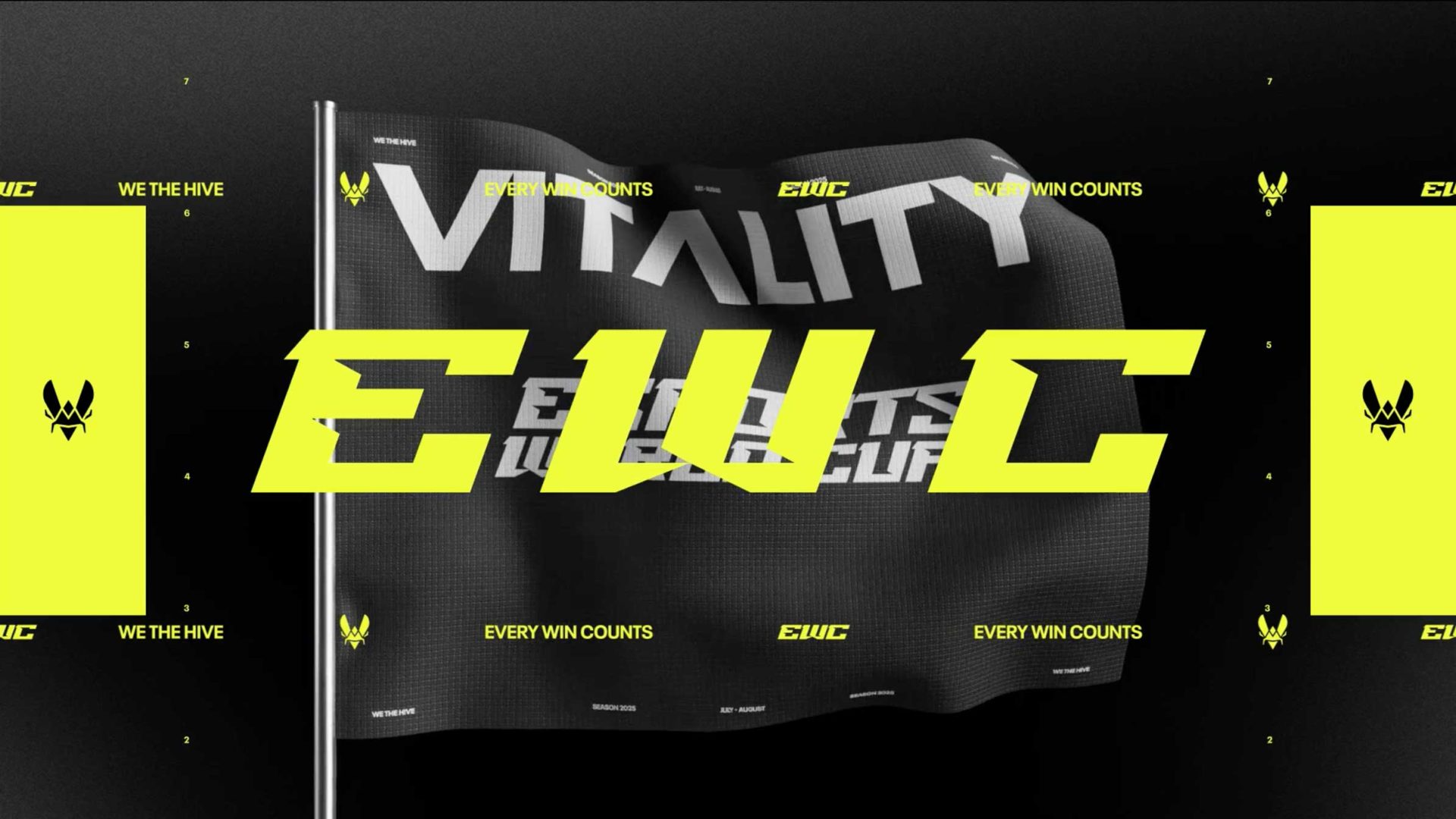 A flag featuring “VITALITY” in white and bold yellow letters “EWC” over it, inspired by NŌBL VITALITY. Smaller text reads “EVERY WIN COUNTS,” with winged logos throughout in a black, white, and yellow palette.