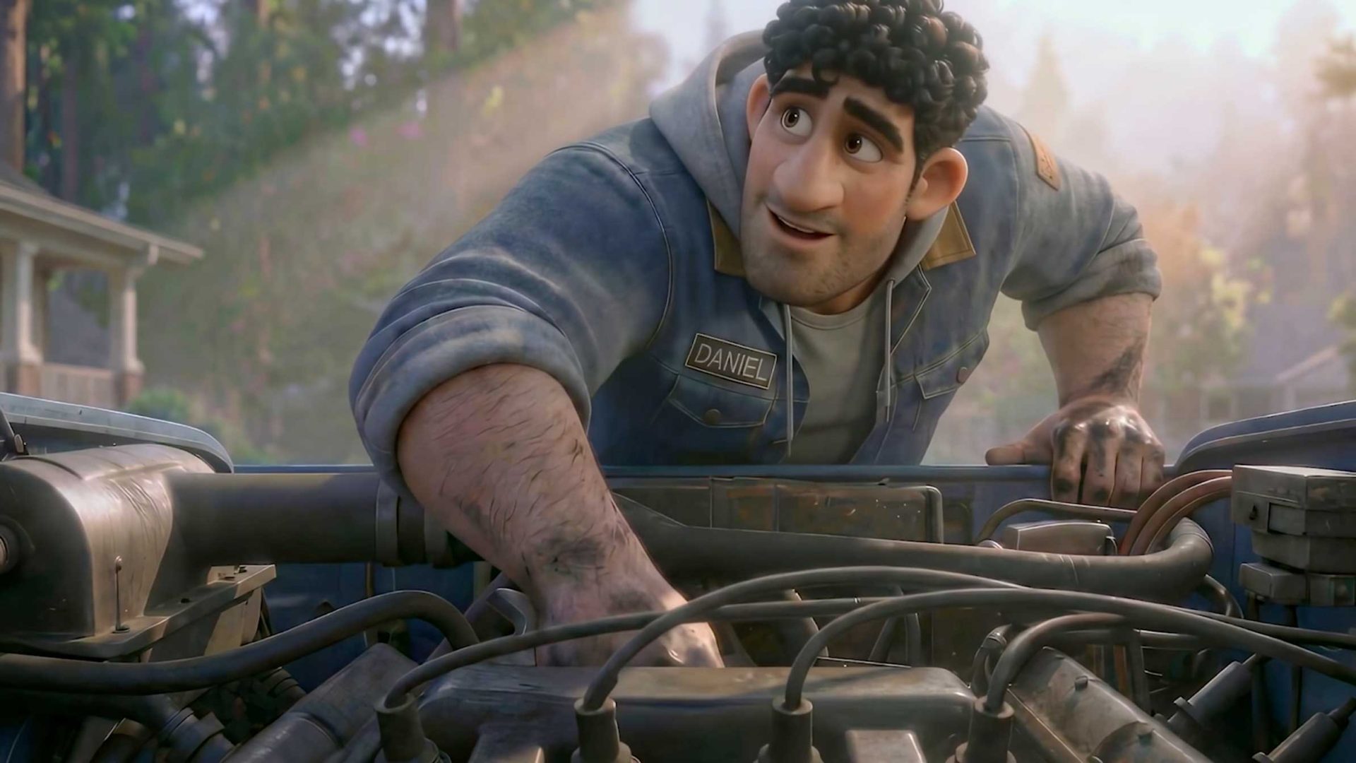 An animated man with curly hair and a denim jacket labeled Daniel is smiling with heart as he works on a car engine outdoors, sunlight filtering through trees in the background. Frame from Stash Magazine article.