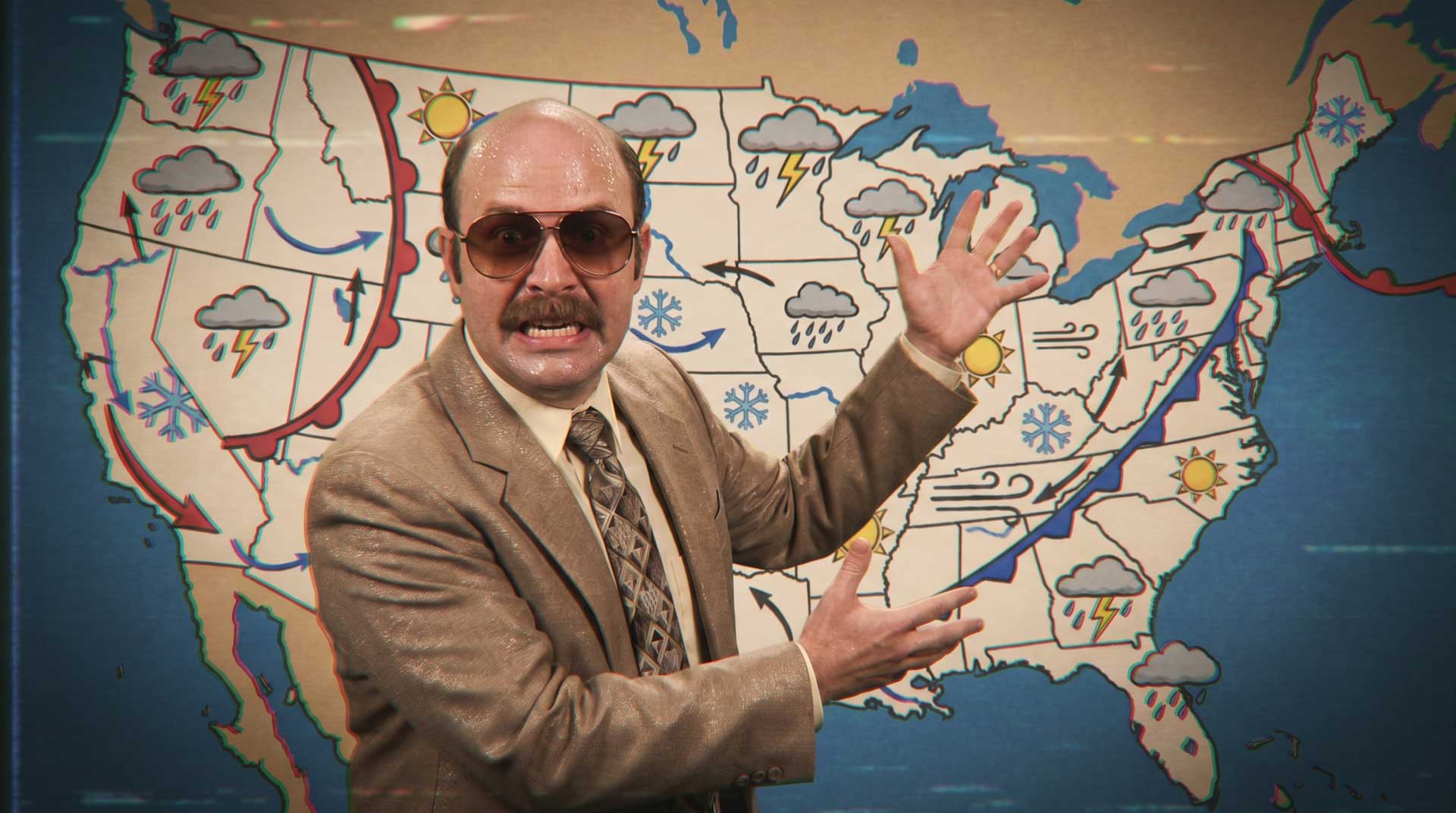 A man in a tan suit and sunglasses gestures animatedly in front of a colorful U.S. weather map, echoing the vibrant style of We Love Pitching Part 7 by Claus Cibilis on Stash, with symbols for rain, storms, snow, and sunshine. Frame from Stash Magazine article.