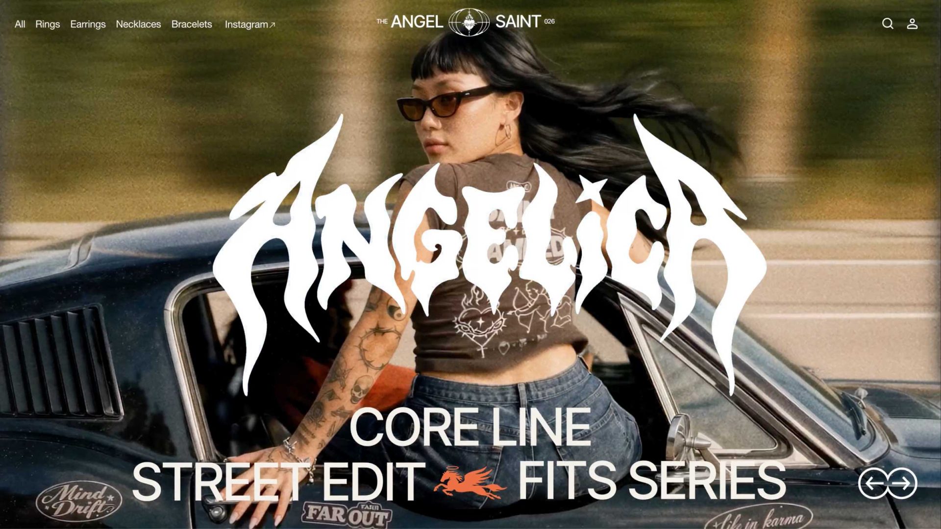 A woman with tattoos and sunglasses sits on the window ledge of a classic black car. Bold “ANGELICA” text overlays the image, with smaller text about a streetwear line and jewelry collection, crafted as a striking product film by Wix Motion Studio. Frame from Stash Magazine article.