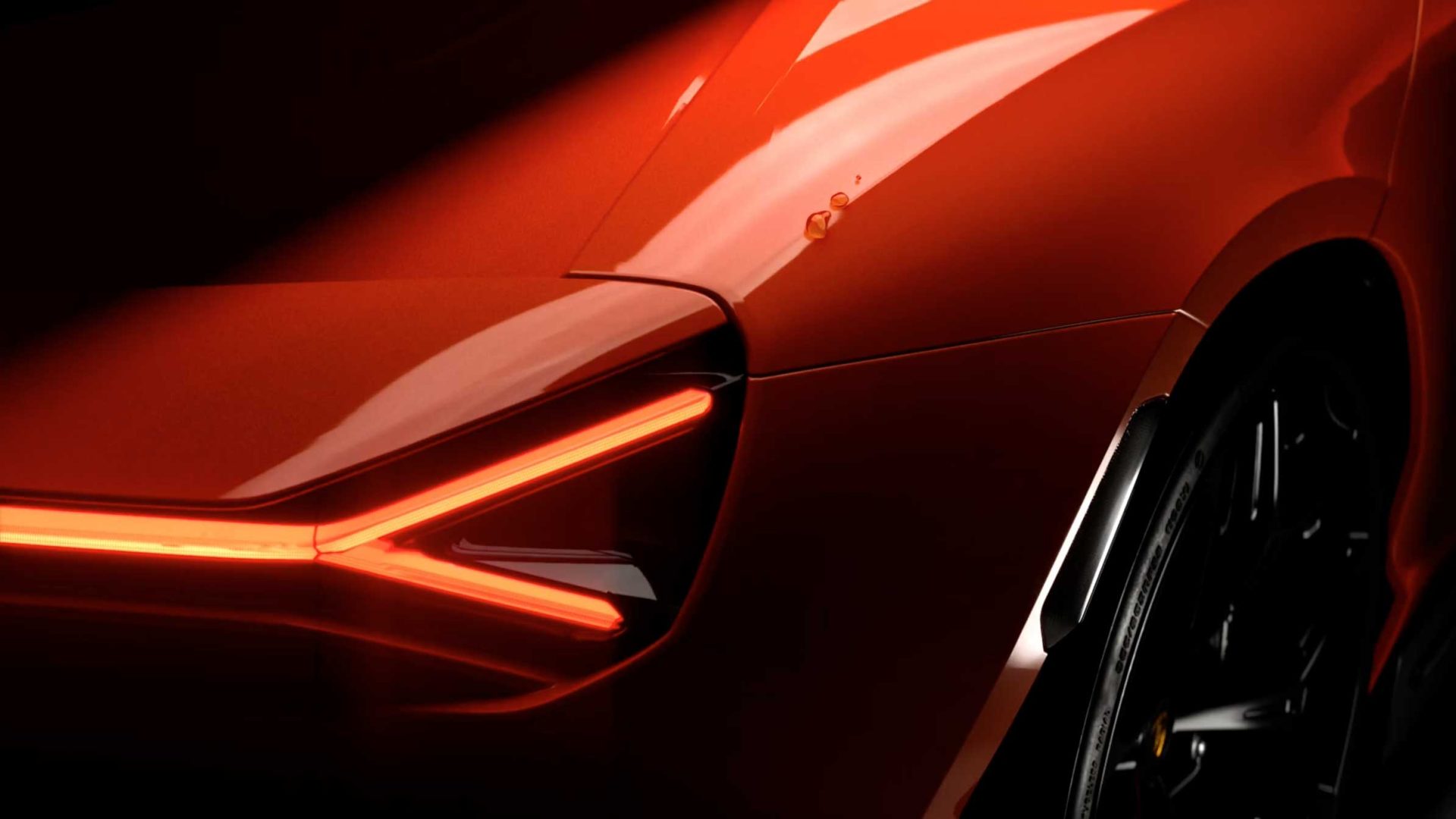 Close-up of the rear of a red sports car, showing sleek body lines, a glowing horizontal LED taillight, and part of a black wheel under dramatic lighting—capturing the cinematic flair reminiscent of the Xerjoff x Automobili Lamborghini product film by Nerdo Studio. Frame from Stash Magazine article.